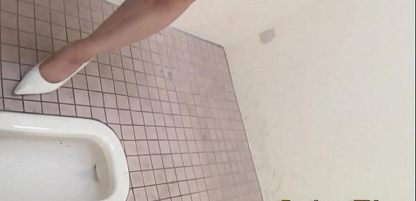  Peeing asians over public squat toilet